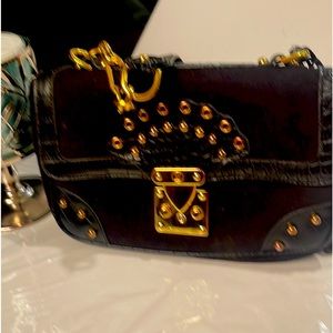 blk suede Bag w/gold color snap close/in 2 pockets 3rd zips/bottom 2worn marks!